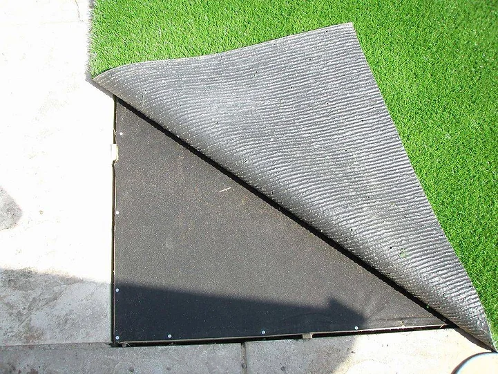 artificial turfgrass mat